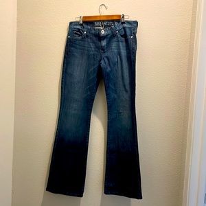 Guess boys blue jeans flared legs uniquely stitched back pockets. Waist 30”.